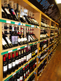 Shelves full of wine bottles